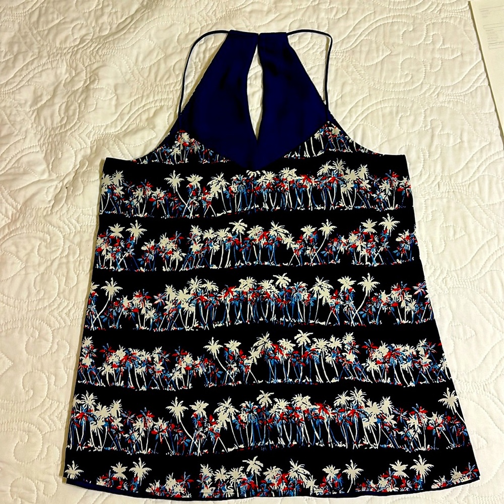 Women’s Express halter top.  Reversible solid blue or palm tree print Size small